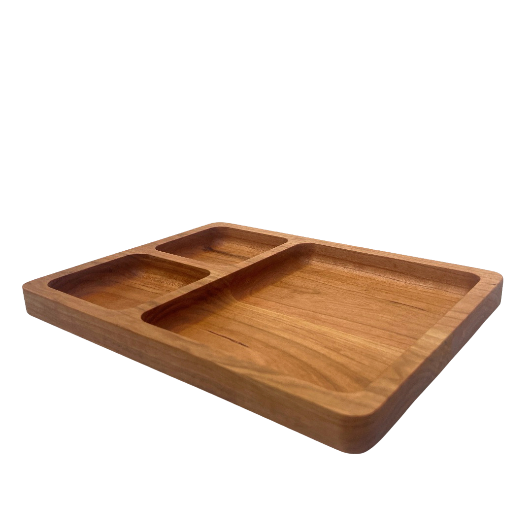 Wooden tray with compartments on a white background