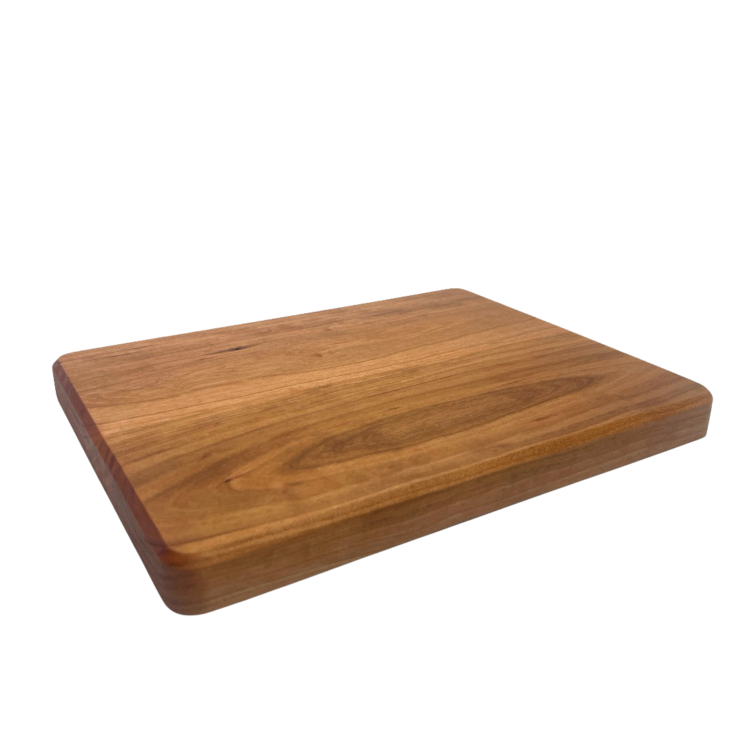 Wooden cutting board on a white background