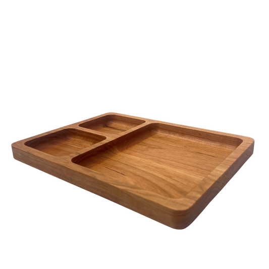 Wooden tray with compartments on a white background
